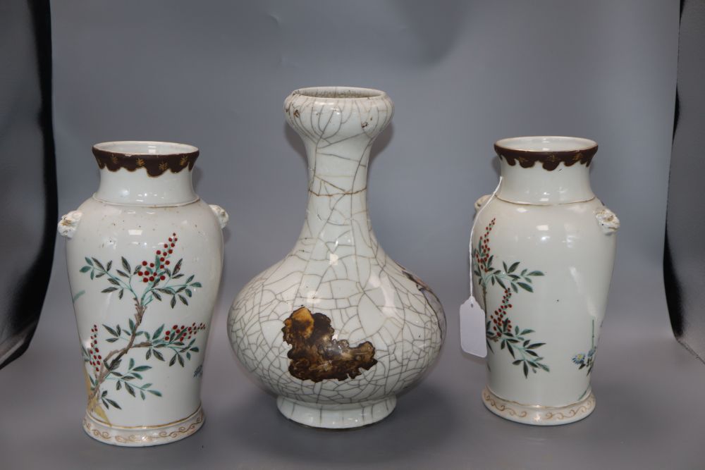 A pair of Chinese ovoid vases with bird, foliate and wheatsheaf decoration and a Chinese Garlic-Head crackle-glazed vase,